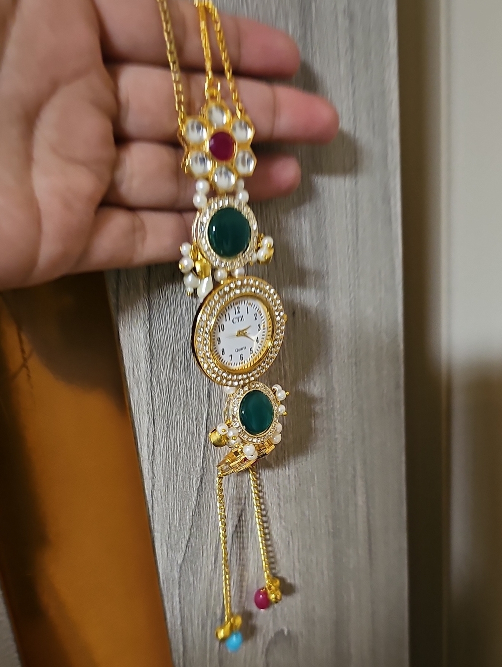 Gold Tone Pendant Watch Necklace with Green and Red Accents